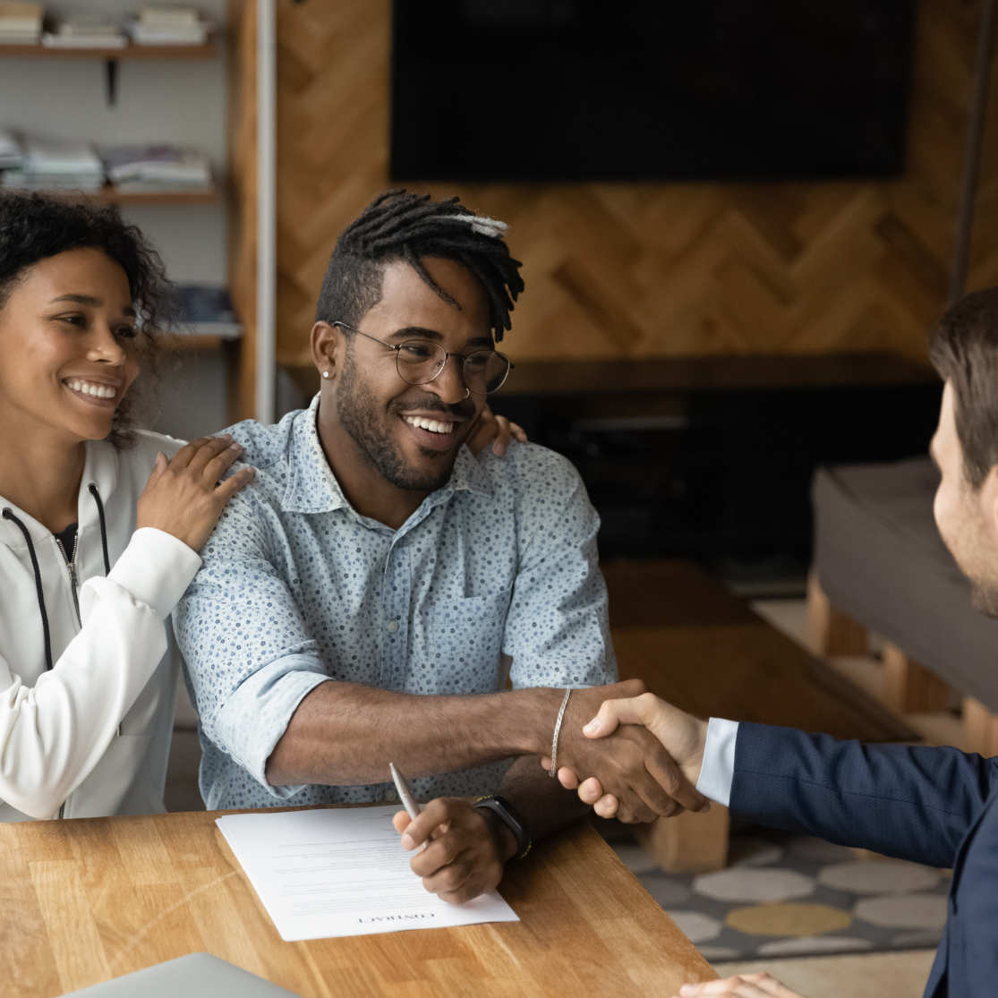 man and woman meeting with banker